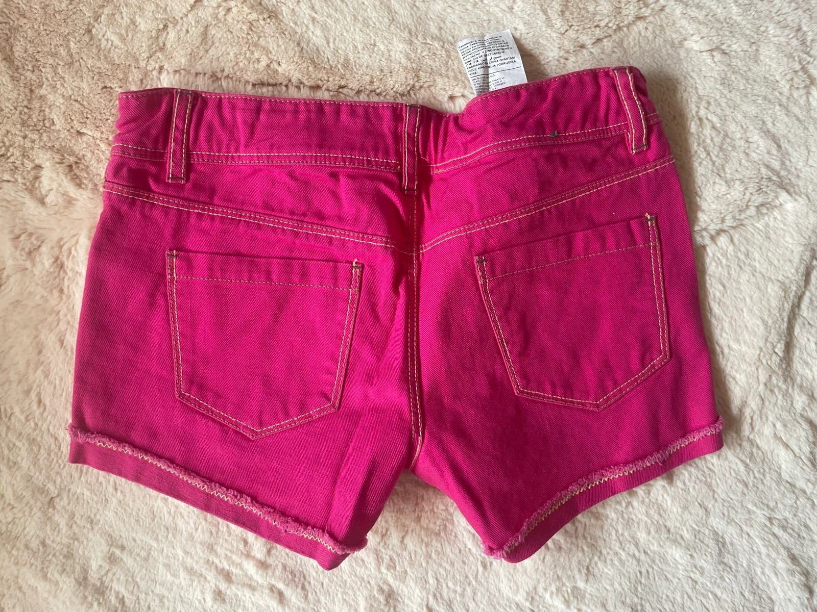 Korte roze Benetton jeans voor 8-9 jaar – photo 2